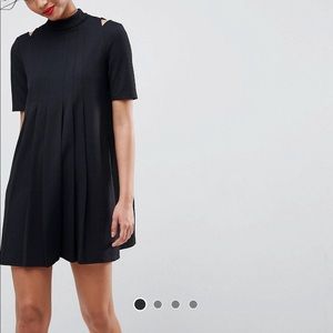 Pleated mini dress with cutout shoulders